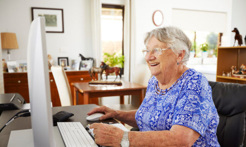 Lady working on computer at Ocean Star Aged Care Home