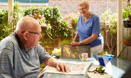 Couple outside at Trinity Village Aged Care