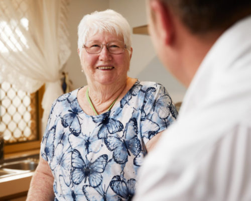 Woman smiling to her Support worker