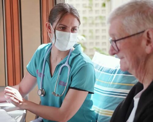 Home Care nurse assisting her client