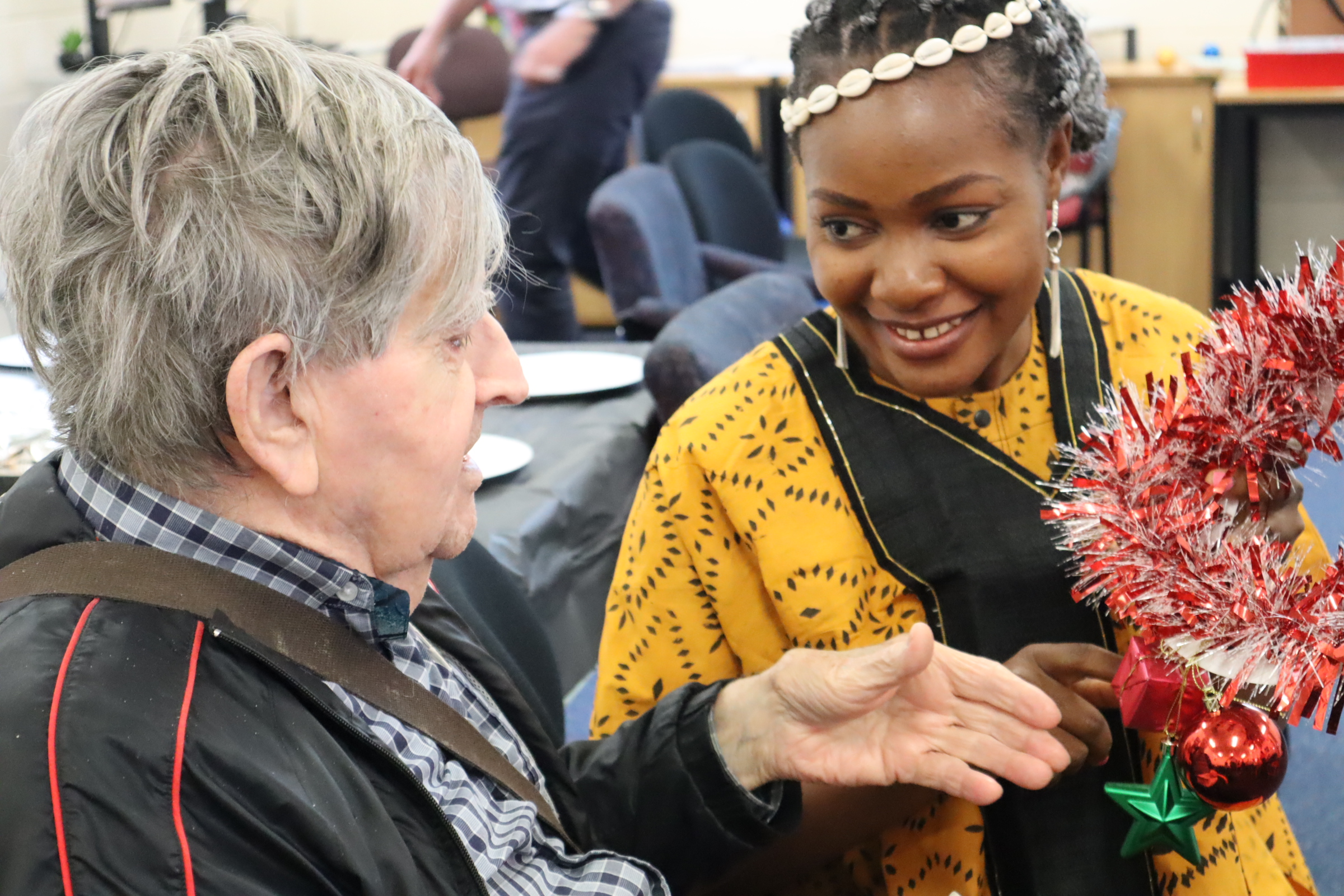 TAFE students share their culture with aged care residents