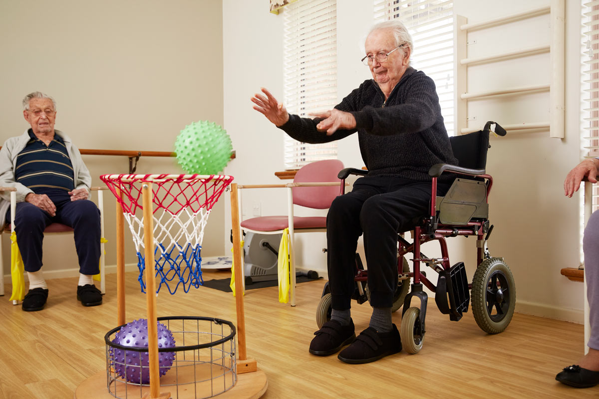 Elderly residents playing games at Trinity Village