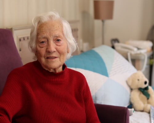 Aged care resident in her room at Castledare residential aged care