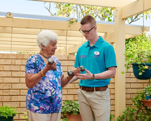 Assisting elderly person with weights