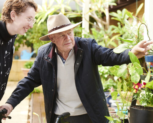 Ian enjoys the plants he tends at Archbishop Goody Hostel