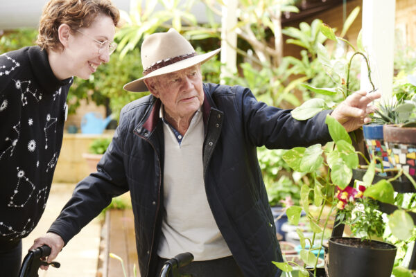 Ian enjoys the plants he tends at Archbishop Goody Hostel