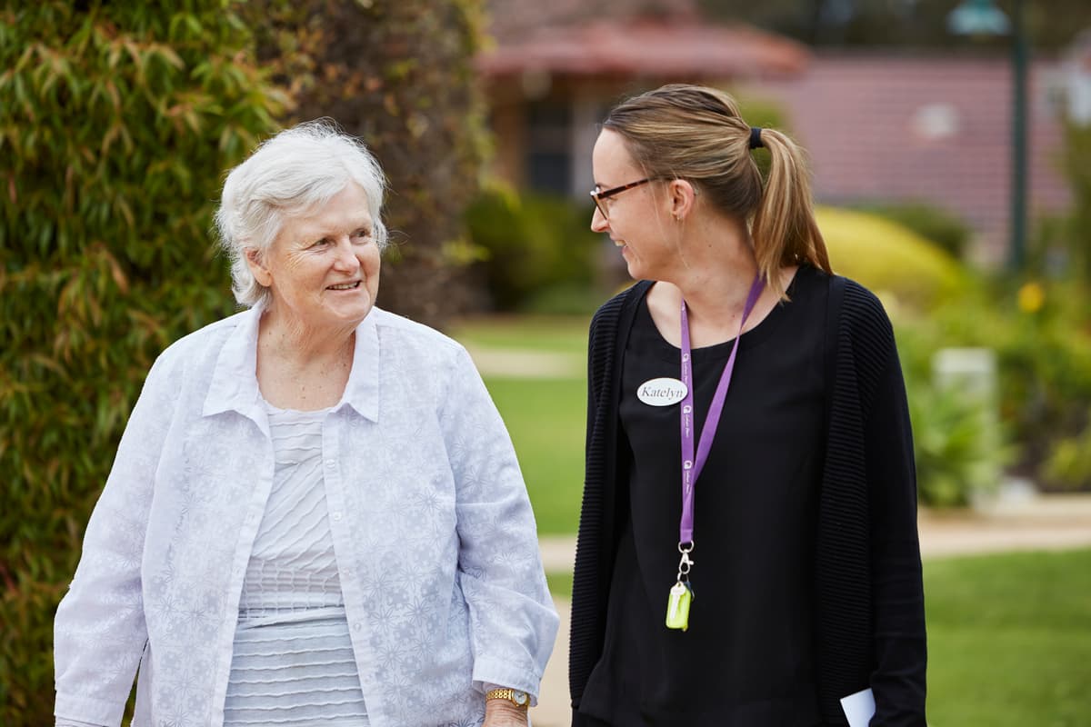 Catholic Homes staff member chatting to Independant Village client