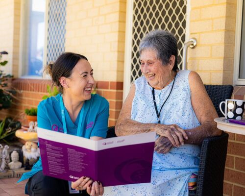 Catholic Homes Home Care staff member talking to a Home Care client