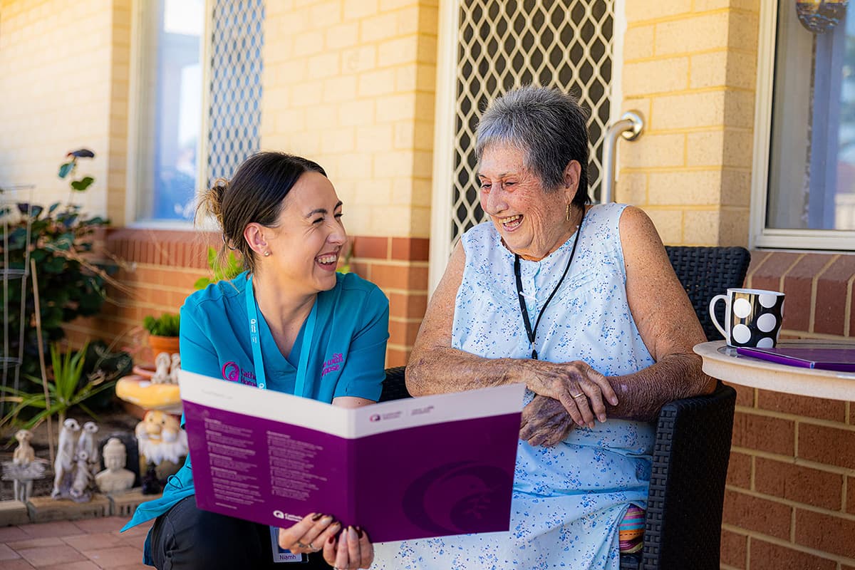 Catholic Homes Home Care staff member talking to a Home Care client