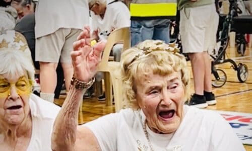 There was no shortage of colour, laughter, and community spirit when Catholic Homes residents from Sister Mary Glowrey, Archbishop Goody, and St Vincent’s took part in the 2025 LiveLighter Aged Care Games at Belmont Oasis Leisure Centre, presented by the Seniors Recreation Council of WA. The Games give older people in care the chance to enjoy team participation, friendly competition, and social connection through adapted games, and this year, Catholic Homes teams made their mark. St Vincent’s won Best Dressed, Sister Mary Glowrey claimed third place, and Archbishop Goody brought plenty of enthusiasm to the arena. For Shirley from Sister Mary Glowrey, it was an unforgettable experience. Having never participated in anything like this before, she embraced the opportunity with open arms. Her family were so proud they were talking about her efforts in the family group chat, and Shirley returned home with not only great memories but new friendships—meeting residents from other floors for the first time. Shirley’s daughter Denise shared her appreciation, “The feedback and photos brought tears to my eyes and made my heart swell in thanks to you all. It seems all who attended and participated enjoyed themselves immensely.” Her son and daughter-in-law, Meg and Bryan, agreed, “It was wonderful to see everyone having a great time, competing and socialising with one another.” The day was a celebration of fun, friendship, and community, the very things Catholic Homes strives to nurture every day.