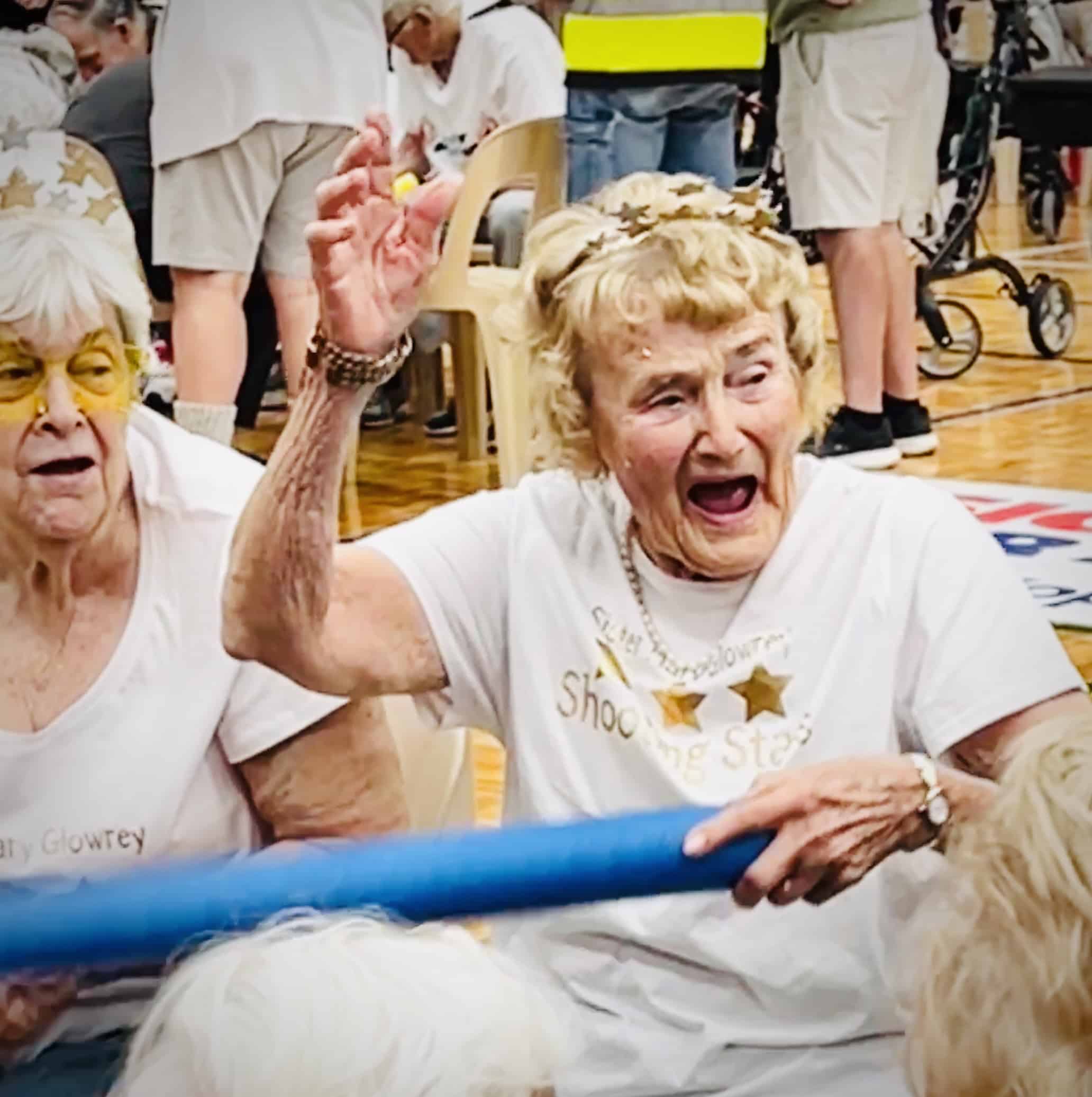 There was no shortage of colour, laughter, and community spirit when Catholic Homes residents from Sister Mary Glowrey, Archbishop Goody, and St Vincent’s took part in the 2025 LiveLighter Aged Care Games at Belmont Oasis Leisure Centre, presented by the Seniors Recreation Council of WA. The Games give older people in care the chance to enjoy team participation, friendly competition, and social connection through adapted games, and this year, Catholic Homes teams made their mark. St Vincent’s won Best Dressed, Sister Mary Glowrey claimed third place, and Archbishop Goody brought plenty of enthusiasm to the arena. For Shirley from Sister Mary Glowrey, it was an unforgettable experience. Having never participated in anything like this before, she embraced the opportunity with open arms. Her family were so proud they were talking about her efforts in the family group chat, and Shirley returned home with not only great memories but new friendships—meeting residents from other floors for the first time. Shirley’s daughter Denise shared her appreciation, “The feedback and photos brought tears to my eyes and made my heart swell in thanks to you all. It seems all who attended and participated enjoyed themselves immensely.” Her son and daughter-in-law, Meg and Bryan, agreed, “It was wonderful to see everyone having a great time, competing and socialising with one another.” The day was a celebration of fun, friendship, and community, the very things Catholic Homes strives to nurture every day.