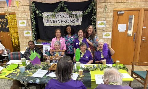 St Vincent’s Residential Aged Care residents and staff in purple as the Vignerons team celebrating together at Catholic Homes Games 2025.
