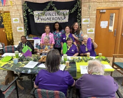 St Vincent’s Residential Aged Care residents and staff in purple as the Vignerons team celebrating together at Catholic Homes Games 2025.