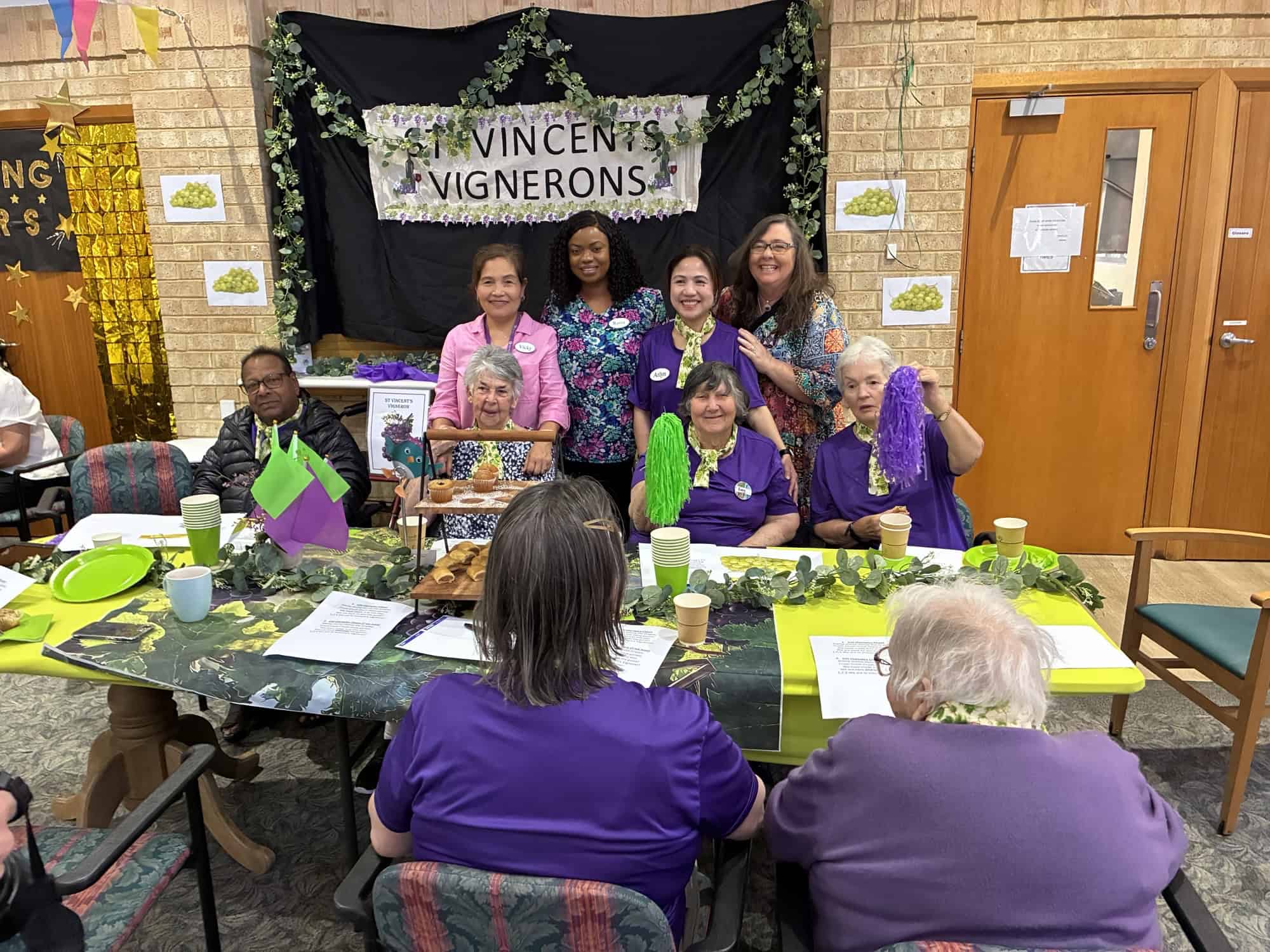 St Vincent’s Residential Aged Care residents and staff in purple as the Vignerons team celebrating together at Catholic Homes Games 2025.