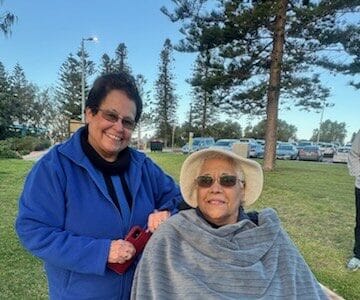 Marie and her husband share a tender sunset moment organised by St Vincent’s in Perth, highlighting compassionate elderly care.