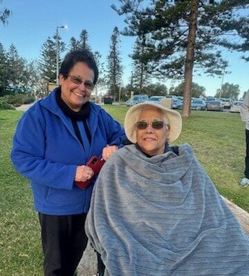 Marie and her husband share a tender sunset moment organised by St Vincent’s in Perth, highlighting compassionate elderly care.